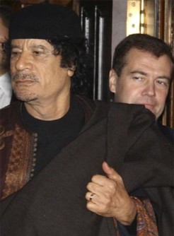 Муаммар Каддафи и 