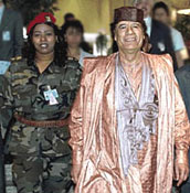 Муаммар Каддафи с телохранительницей